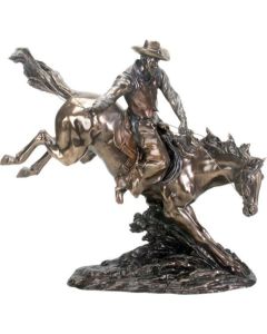 Cowboy on Bucking Horse Statue